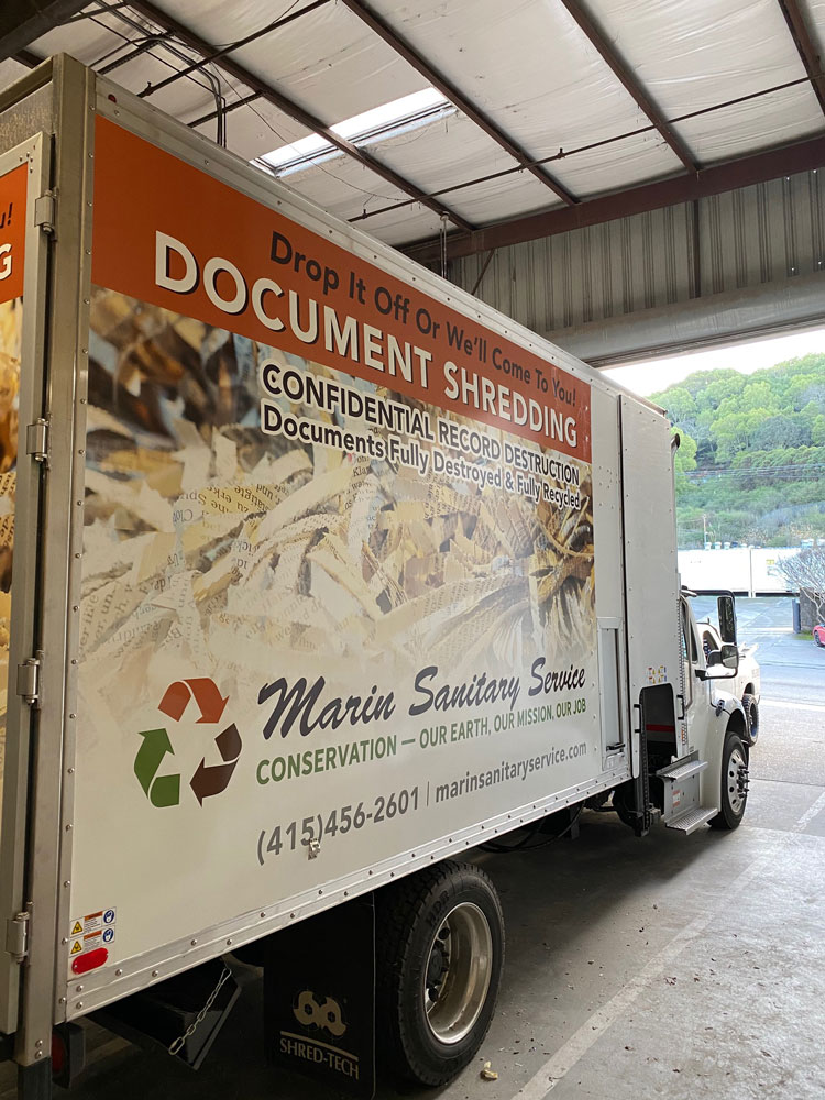 Side view of a Marin Sanitary Service Mobile Document Shredding Truck